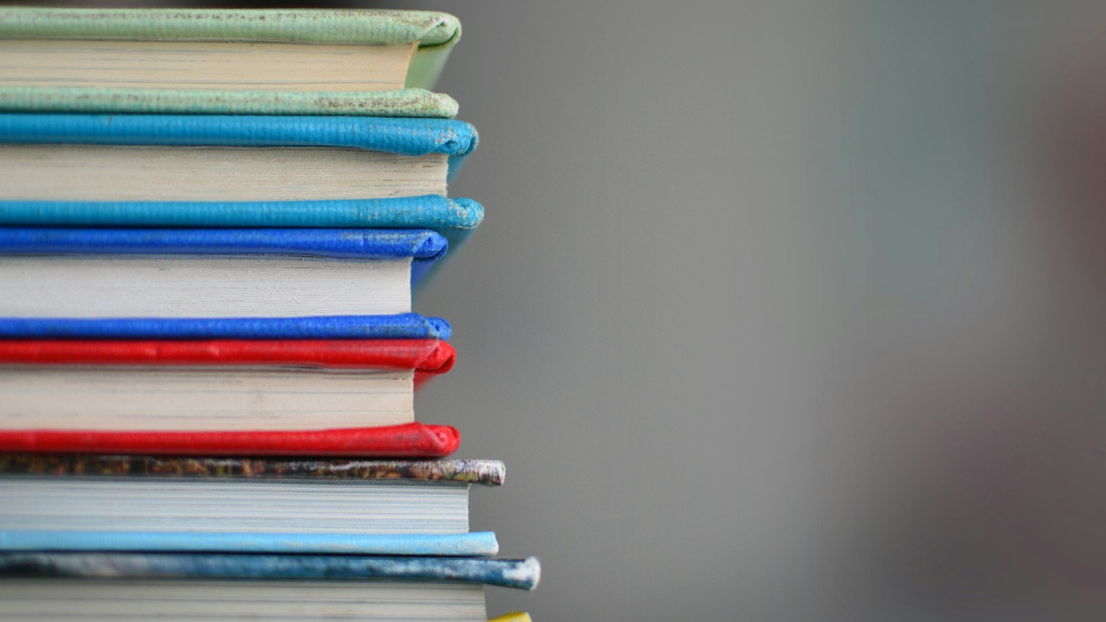 Business books and audiobooks: shallow focus photography of books