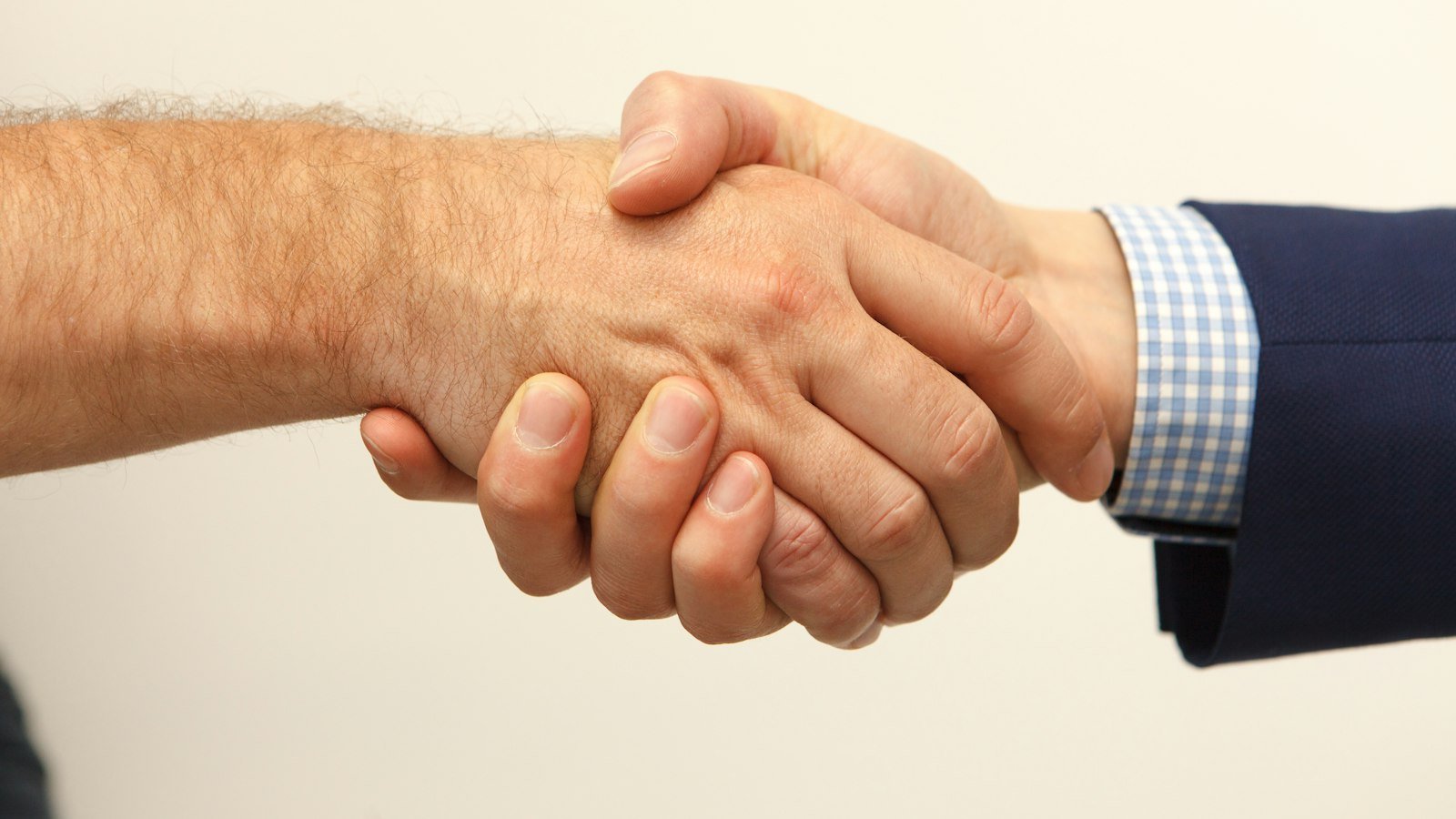 Buying a business opportunity: man and woman holding hands