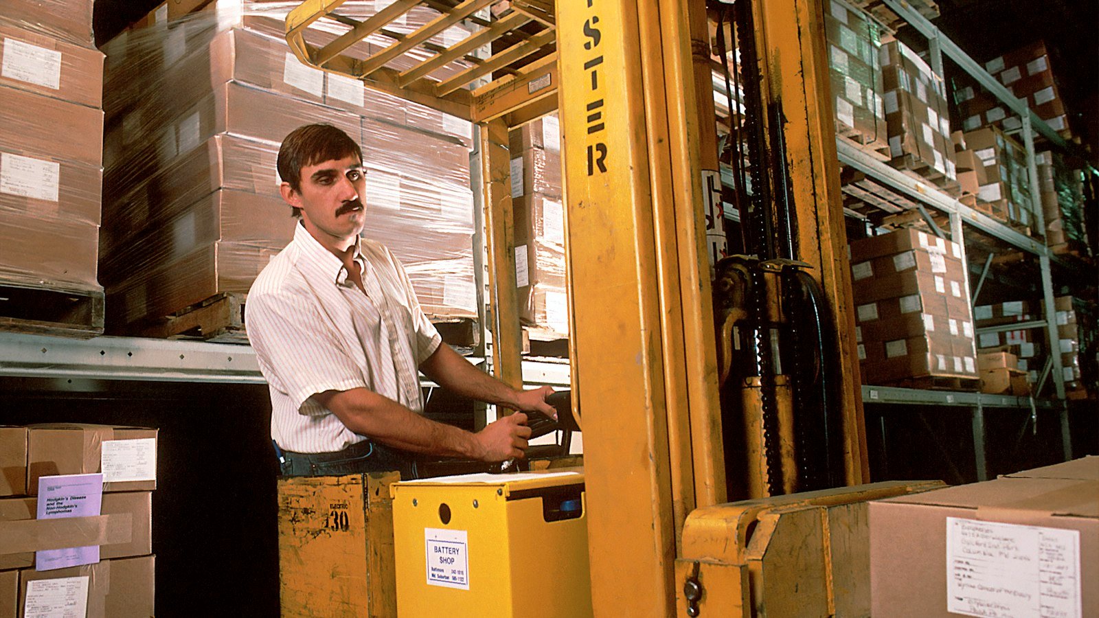 Cash flow for distributors: yellow driving forklift