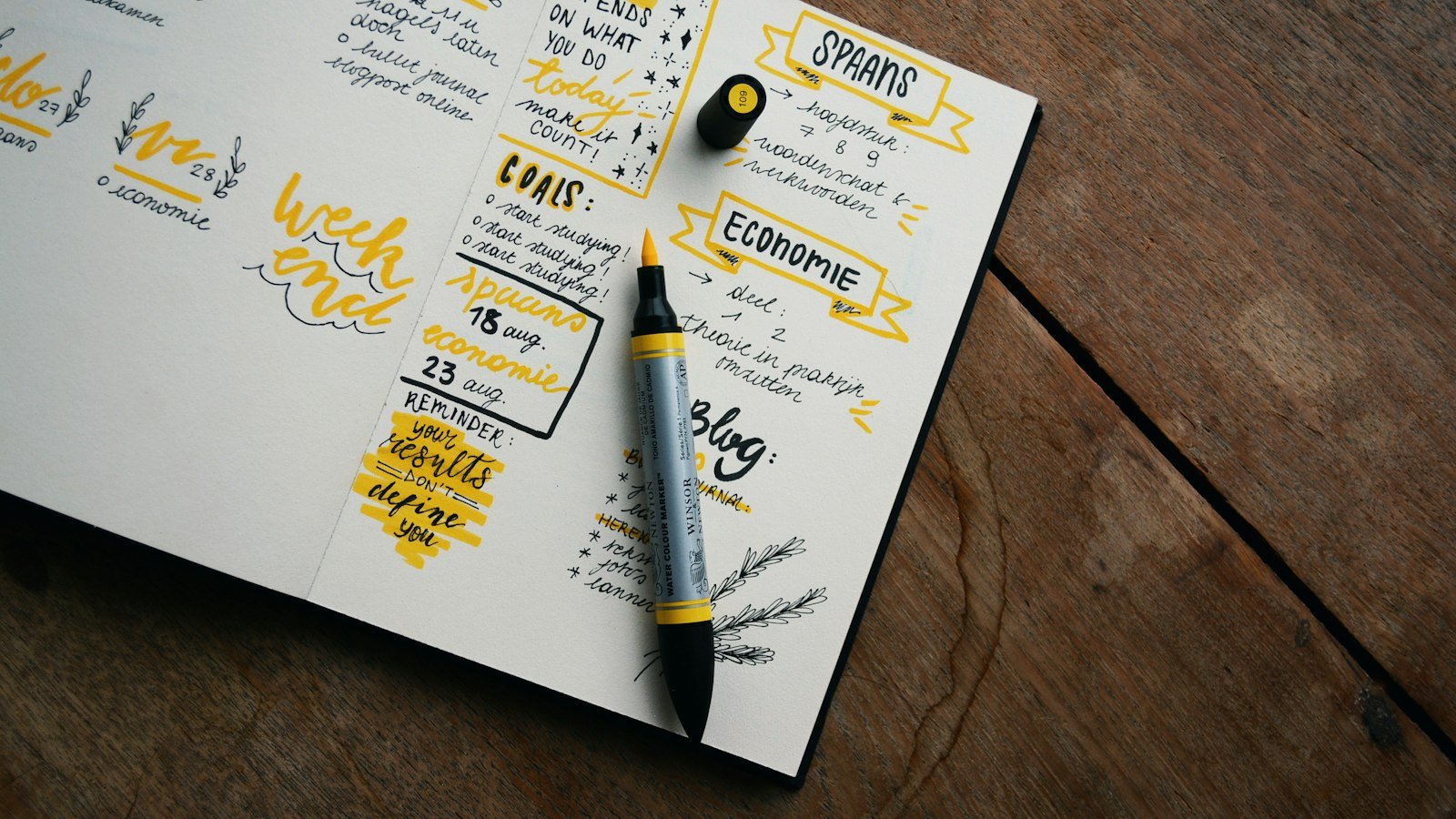 Dba vs llc: black and gray pen on table