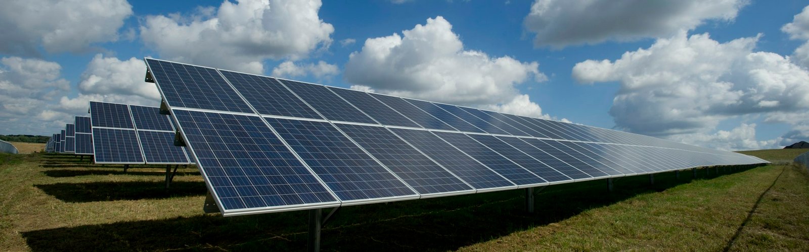 Solar panels under a blue sky