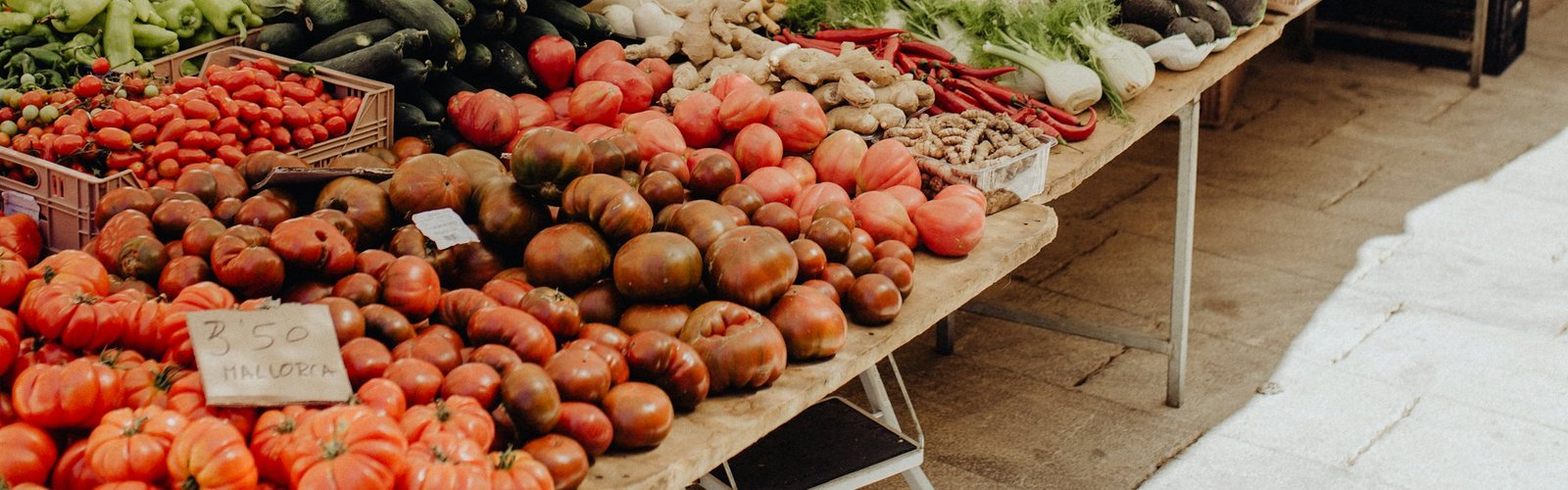 Fresh produce displayed on a market stall