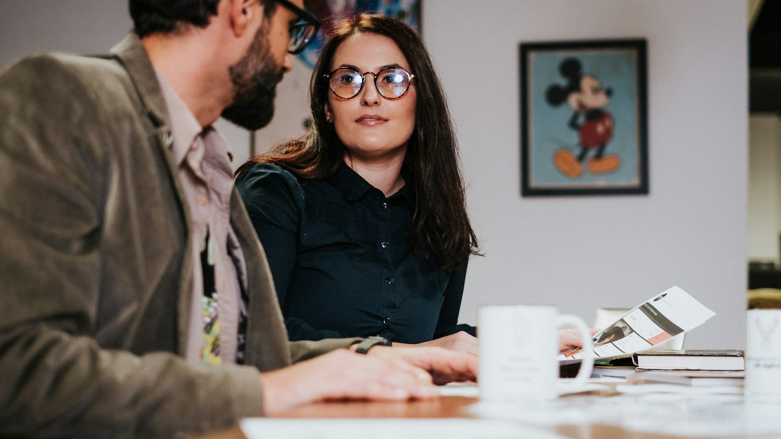 Saying no as a business owner: man and woman sitting at table