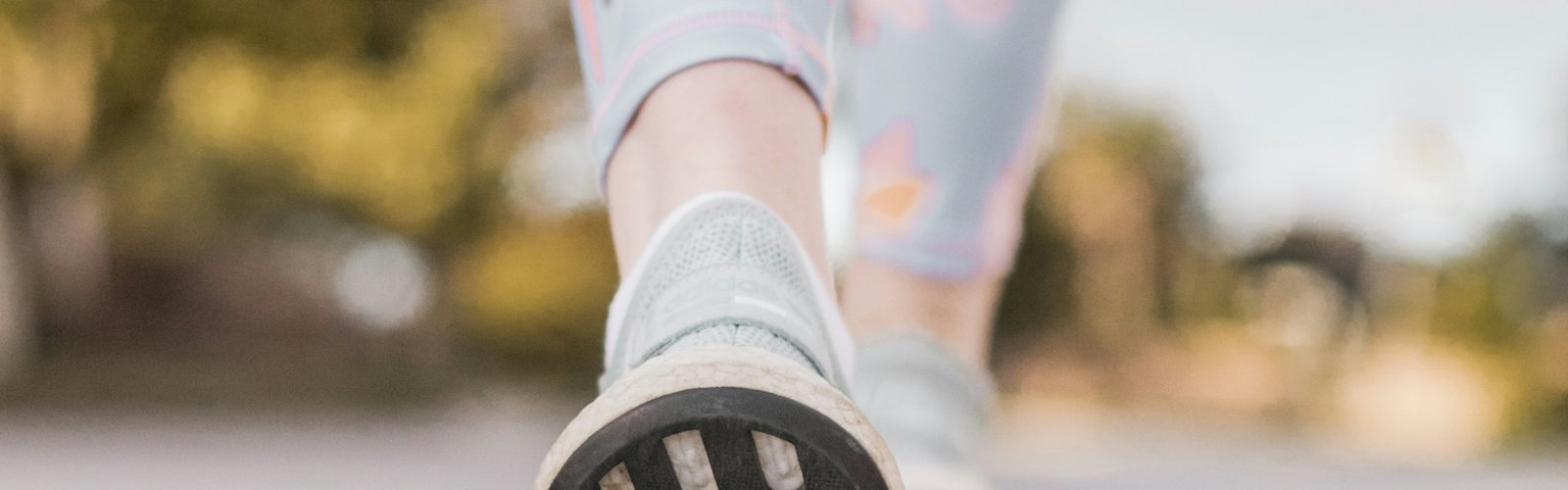 Career-ready habits: Sneakers walking along a city path