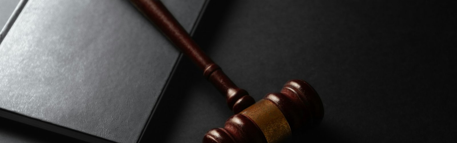 Legal market business opportunity: Judge's gavel resting on a dark desk