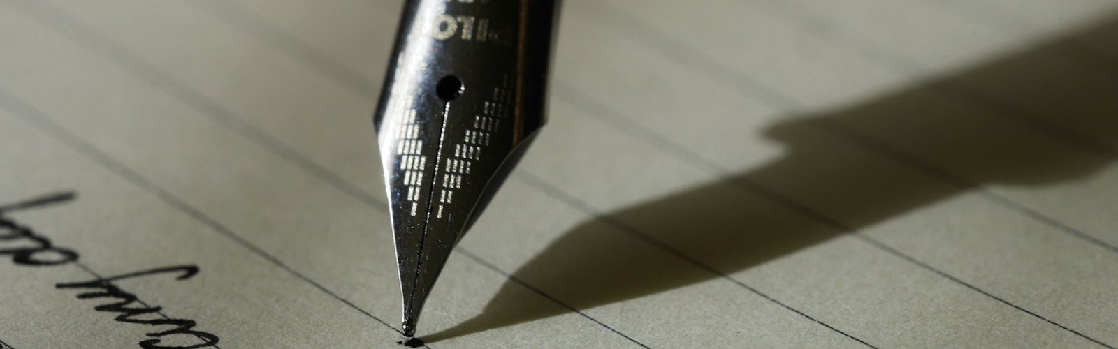 Fountain pen resting on paper