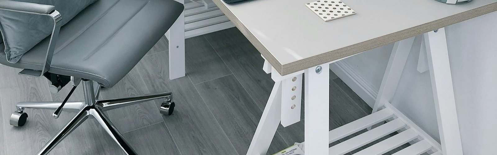 White desk and chair in a bright home office